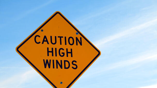 Portion of Lex-Springmill Closed, Wind Caused Power Poles to Lean Over Road
