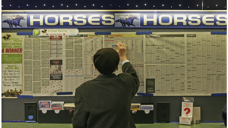 Punters Take A bet On The Grand National