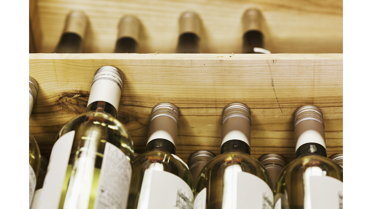 Close up of crates of wine bottles