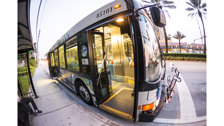 people in the downtown Metro bus in Miami, USA. Metrobus operates more than 90 routes with close to 1,000 buses covering 41 million miles per year.