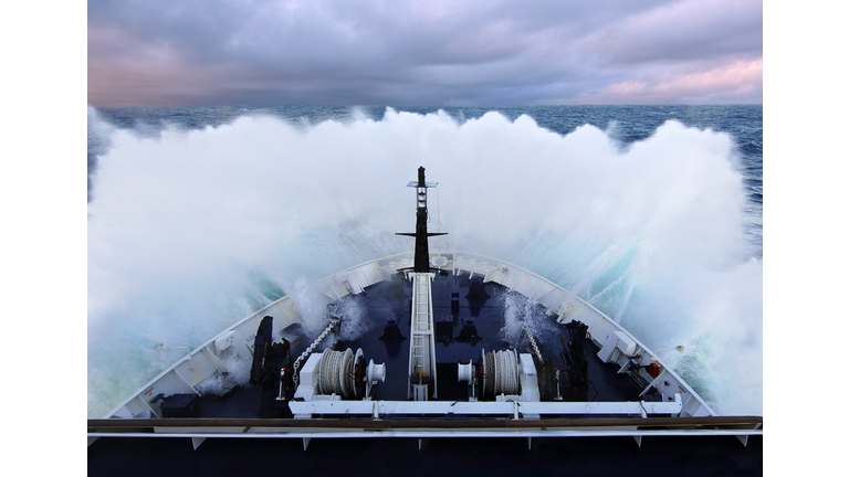 Cruise ship crashing through waves in Atlantic Nor
