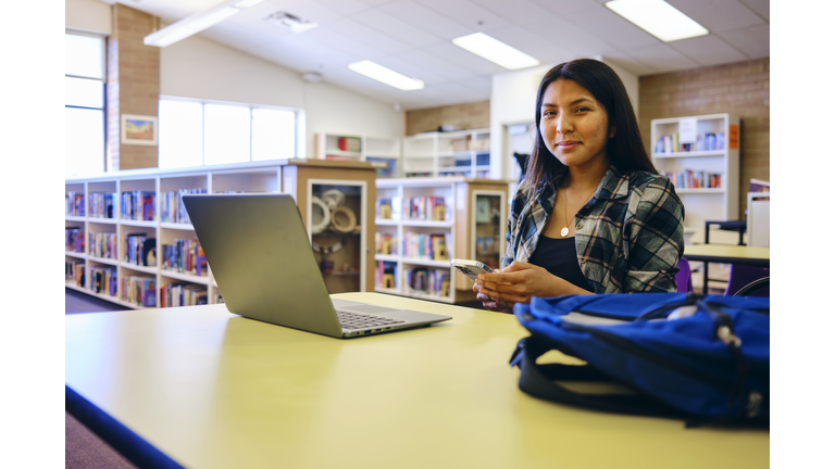 High School Student in a Library