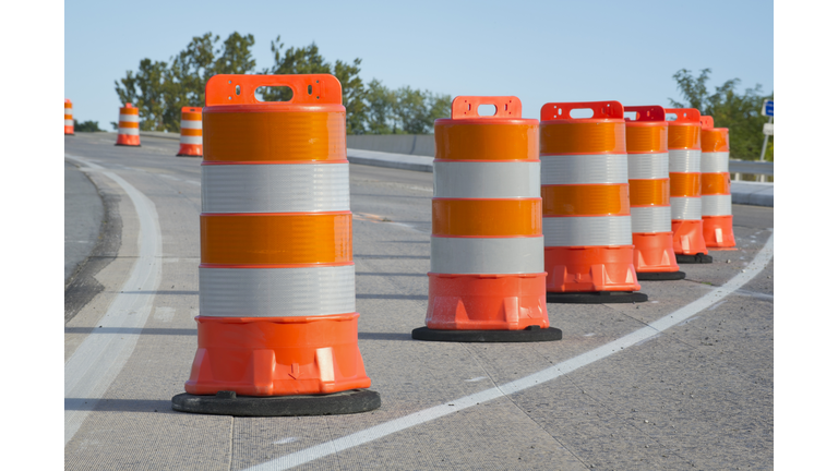 Orange barrels used in highway maintenance construction