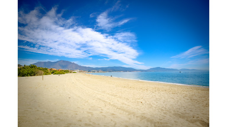 Beach beautiful sunny day sand sea ocean sky mountain manilva estepona