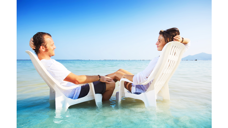 Couple enjoys in the tropical sea