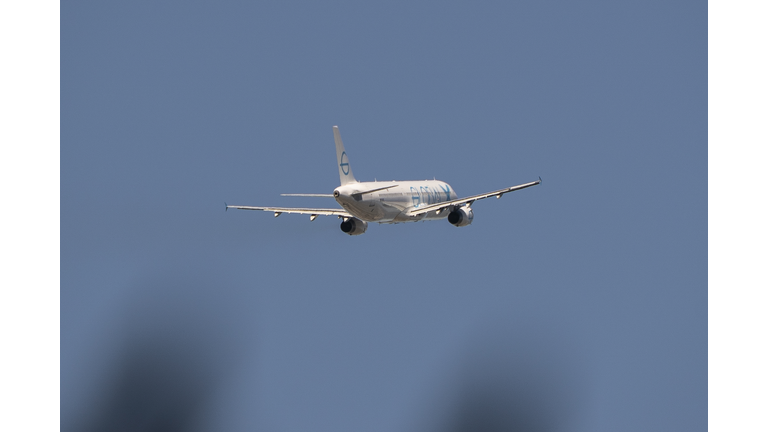 Detainees Are Loaded Onto ICE Flights At Seattle's King County International Airport