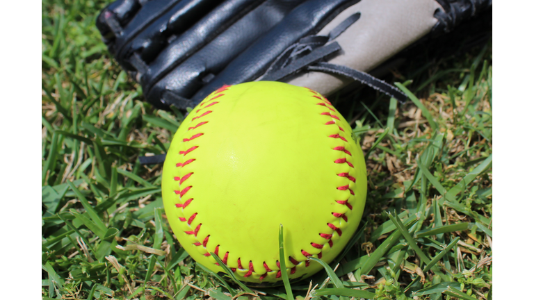 Softball closeup with mitt