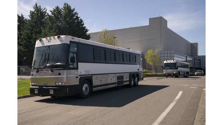 Detainees Are Loaded Onto ICE Flights At Seattle's King County International Airport