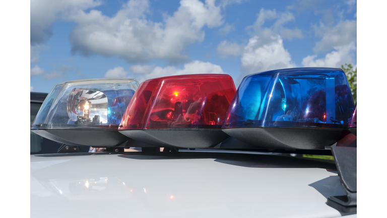 Closeup of police car siren flashing lights
