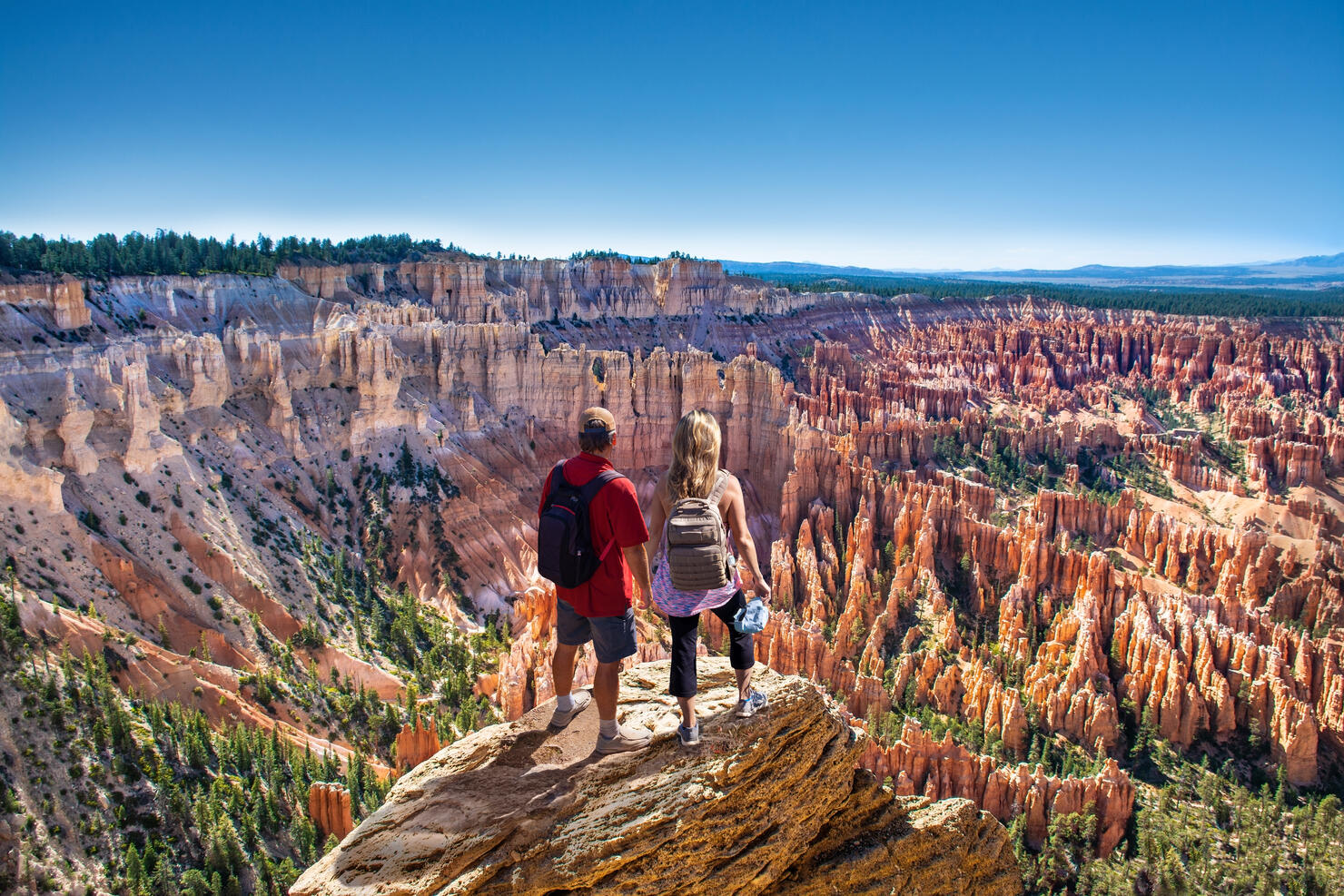 Couple enjoying  beautiful  mountain view.