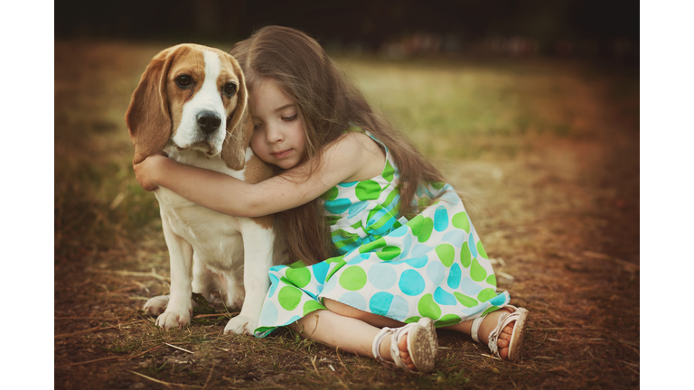 little girl with dog