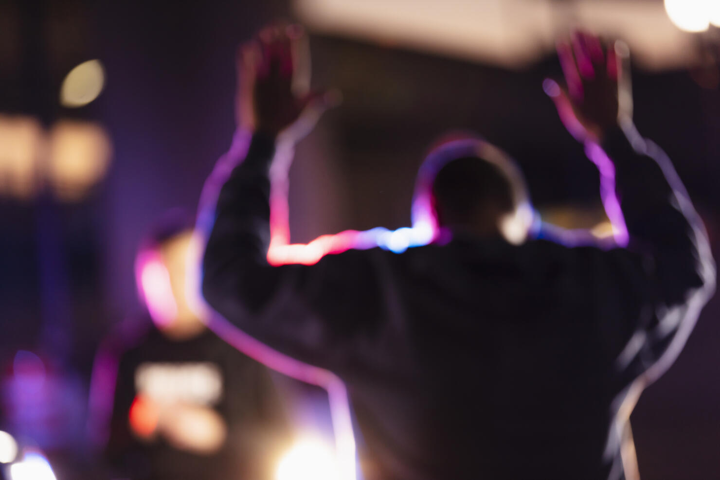 Man surrendering to police at night