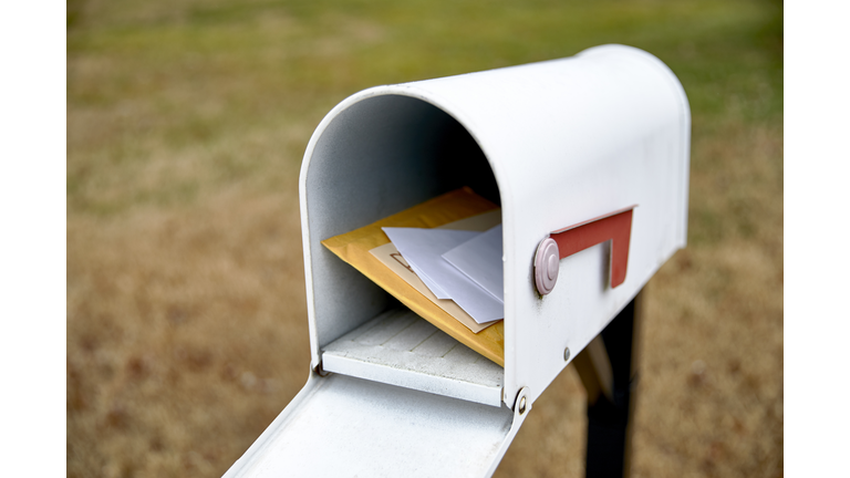 Open Mailbox with Letters Inside