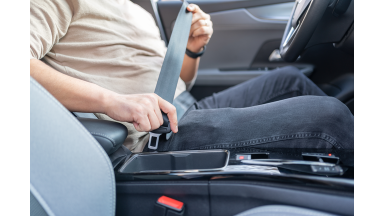Putting On Safety Seatbelt
