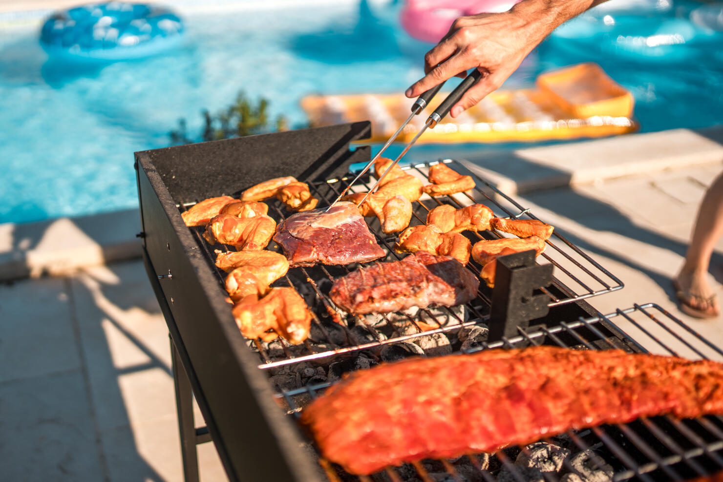 Sizzling Meat on the Grill by Hispanic Chef