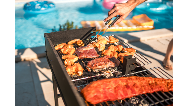 Sizzling Meat on the Grill by Hispanic Chef