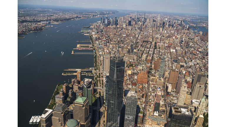 Aerial panorama of Manhattan Skyline from Downtown, over Freedom Tower, toward Midtown and Upper Manhattan, Harlem, and The Bronx.