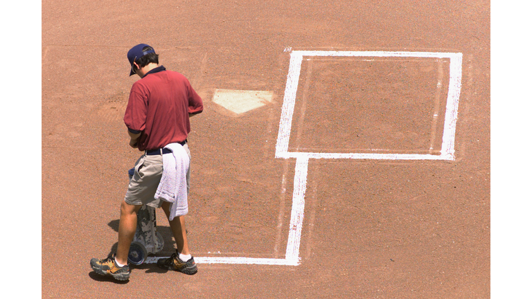 Grounds crew marks lines