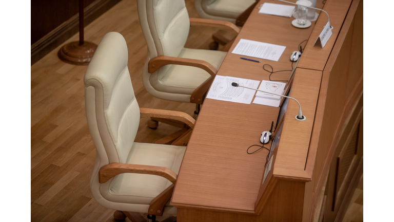 Conference room or seminar meeting room in business event. Session of Government. Academic classroom training course in lecture hall. blur abstract background. working in modern bright office indoor