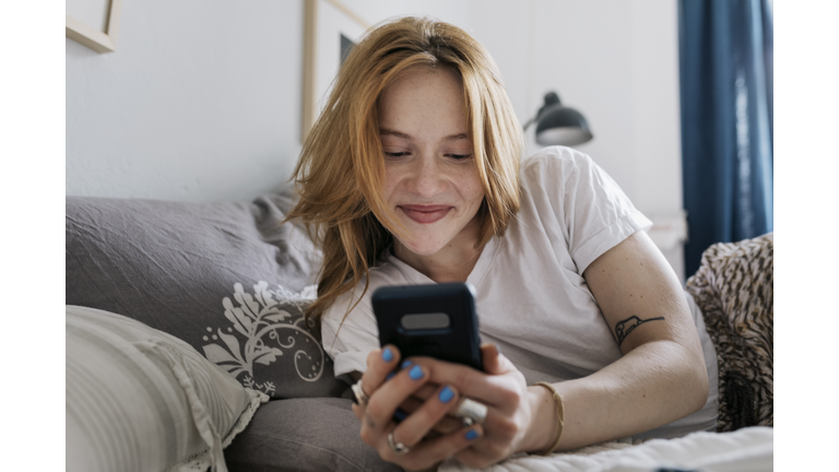 Woman Messaging Using Online Dating App