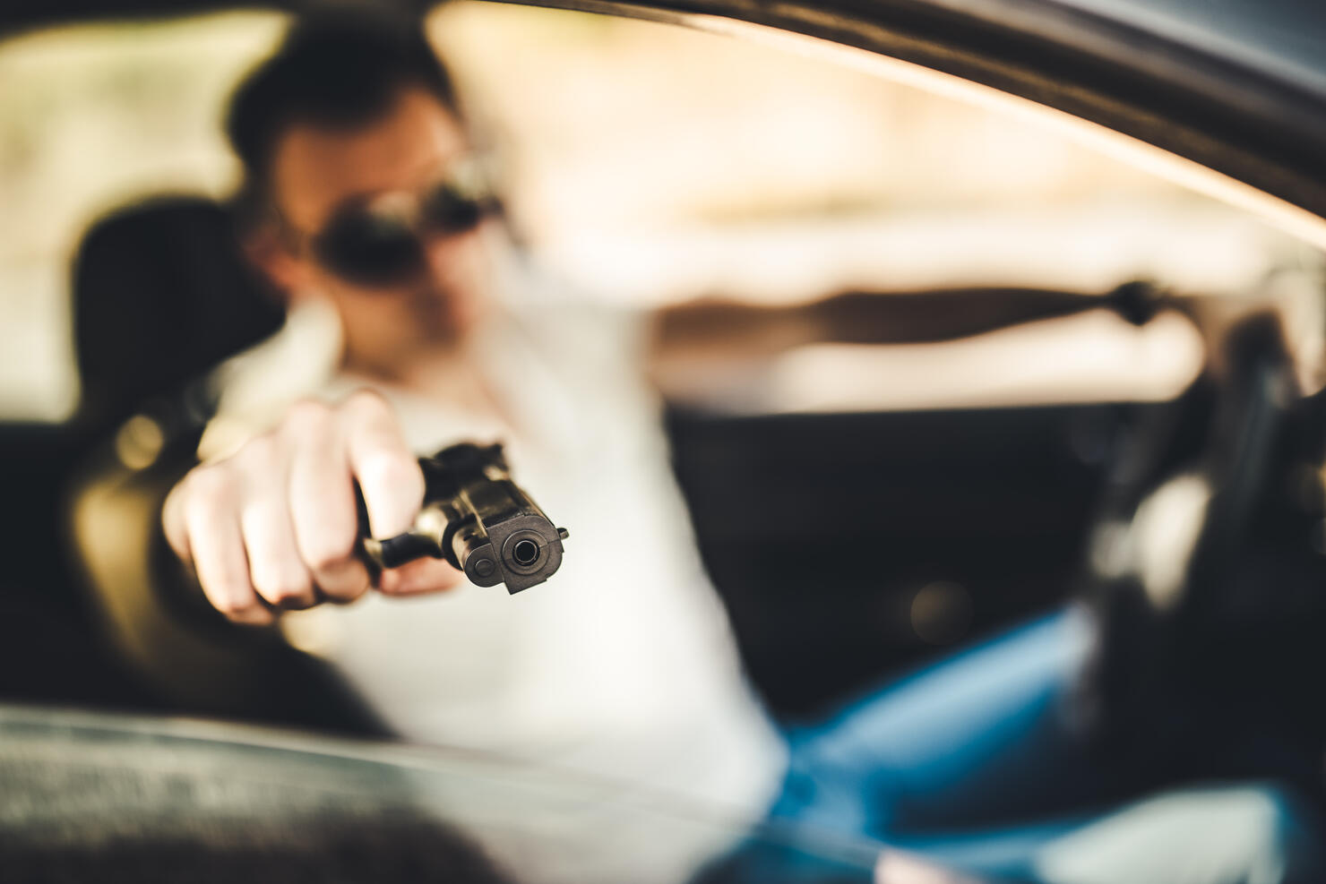 At a gunpoint