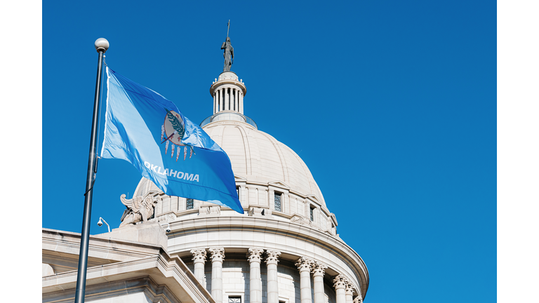 Low Angle View of the Oklahoma Flag at the State Capitol building in Oklahoma City
