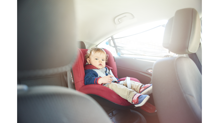 Baby boy in car seat