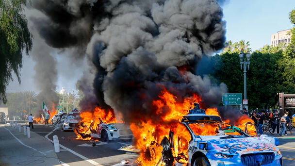 After Cars Torched, Waymo Robotaxis Suspended During "No Kings" Protests