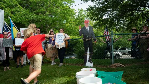 'No Kings Day' Protest: Kids Hit Trump Effigy, Elderly Man Beats Trump Doll