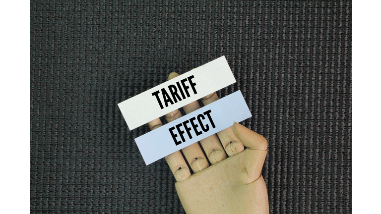 Colored paper with the word tariff effect. Tariffs are a tax placed by the government on imports. They raise the price for consumers, leading to a decline in imports