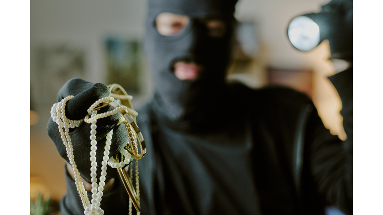 Jewelry in Thiefs Hand