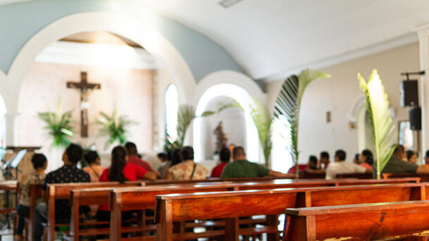 Security Guard Fatally Shoots Gunman Who Opened Fire During Church Service