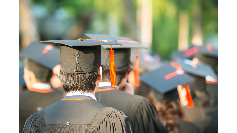 back of graduates during commencement