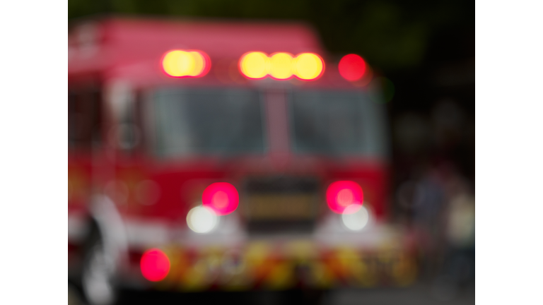 Fire Engine Blurred Out of Focus  Lights in Parade