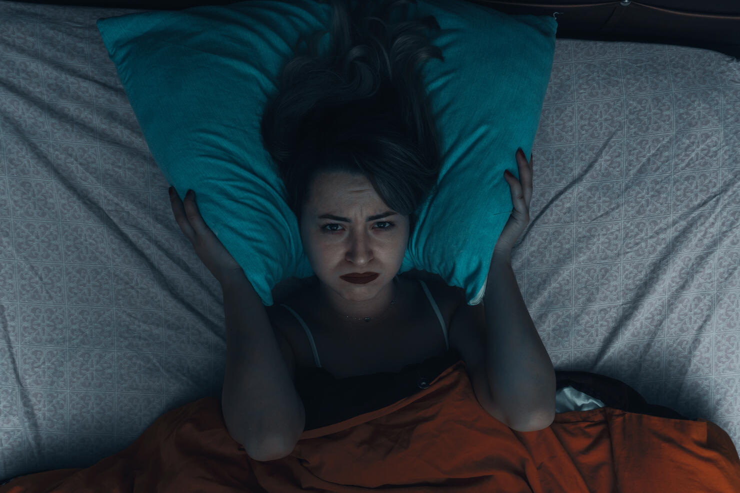 Sad Woman Lying On Bed