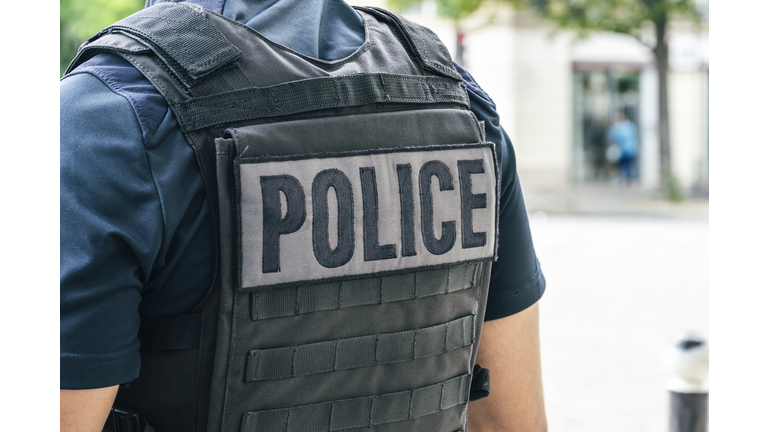 “Police” written on the back of a French police uniform (France)