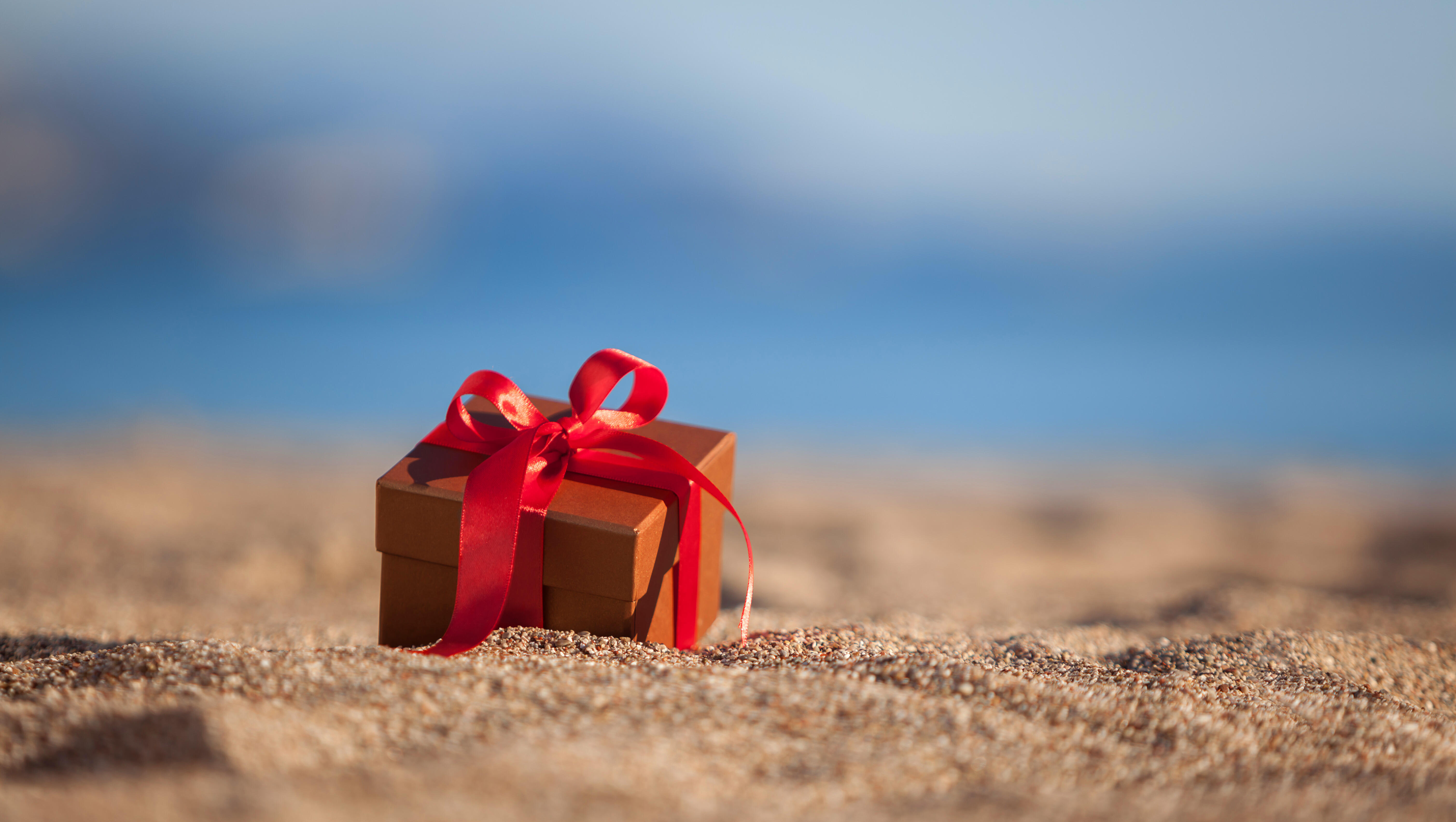Man Makes Horrific Discovery Inside Gift-Wrapped Box On The Beach