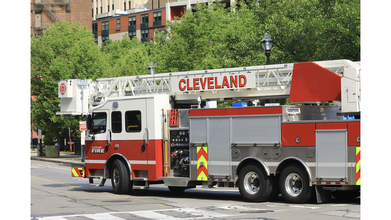 Fire brigade truck with high-rise ladder and water pumper