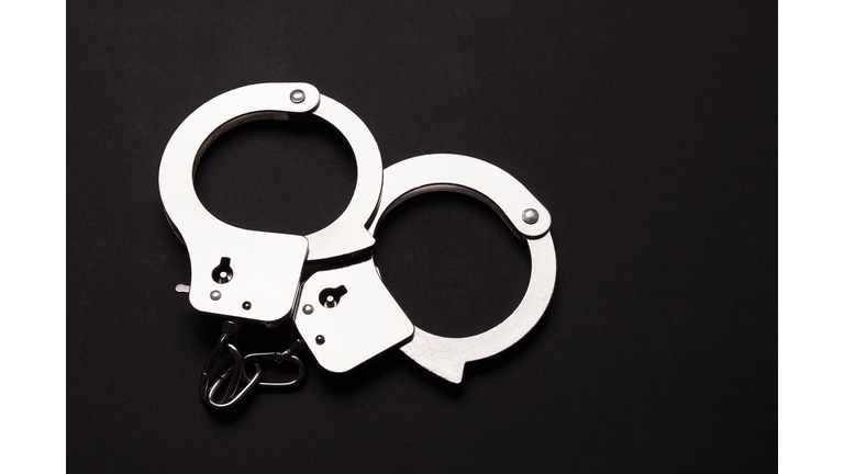 Handcuffs on a black background