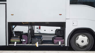 National News - Woman Charged After Toddler Found In Suitcase In Bus' Luggage Compartment