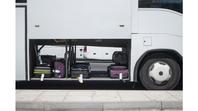 Passenger Buses Waiting for Luggages.