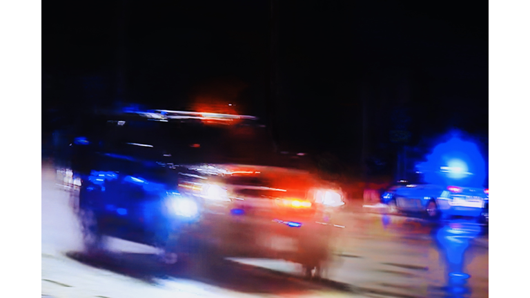Flashing lights from a high speed police chase
