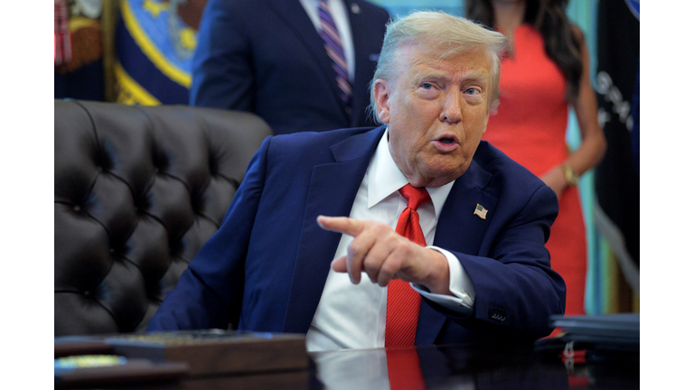 President Trump Signs Executive Orders In The Oval Office Of The White House