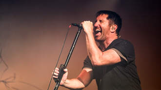 Crowd Surfing Santa Makes Trent Reznor But Out Laughing 