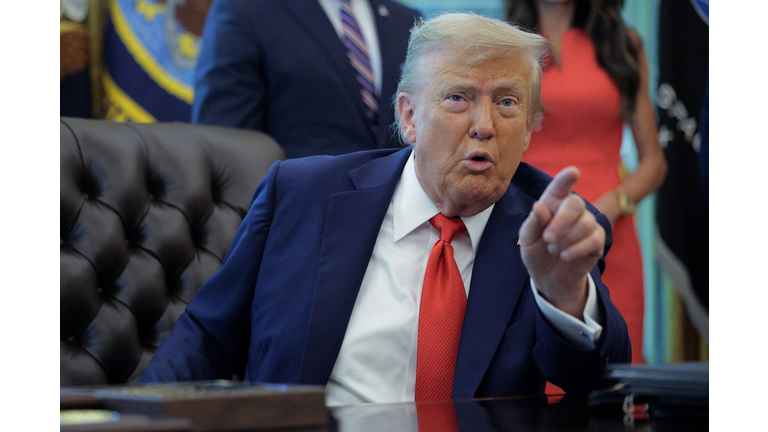 President Trump Signs Executive Orders In The Oval Office Of The White House