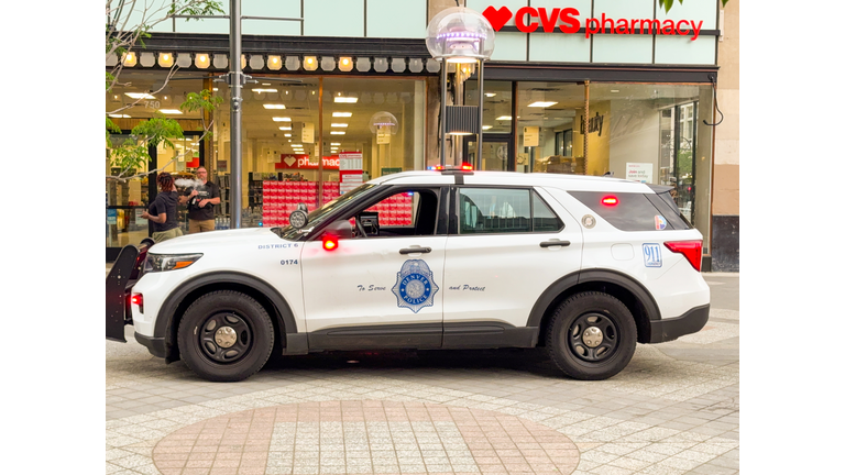 Police patrol car of the Denver Police Department with flashing lights