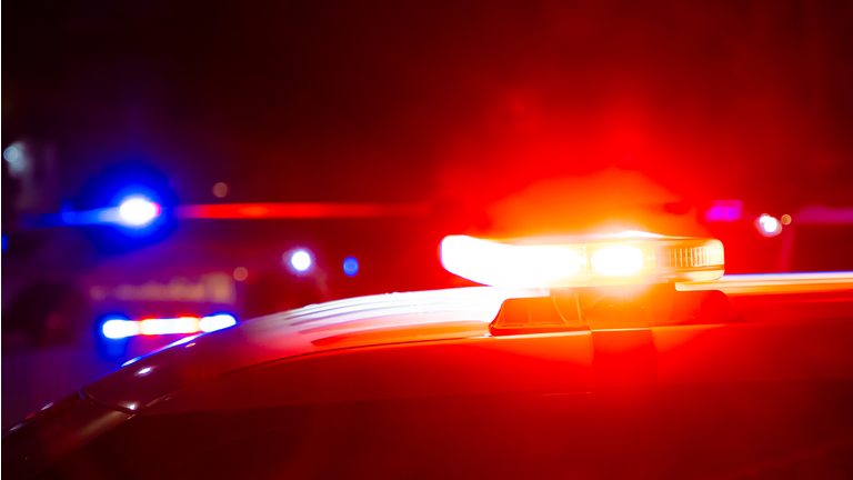 Police flashing lights at crime scene