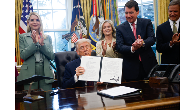 Donald Trump Signs Memorandum In The Oval Office