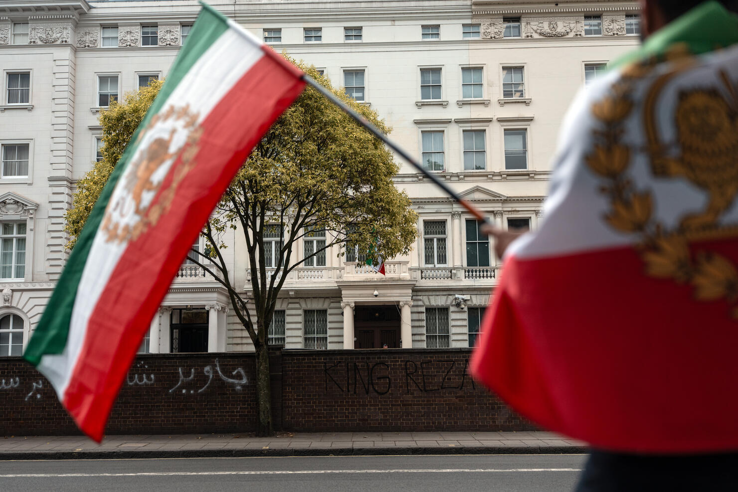 Protest Outside Iranian Embassy In London After Israel, US And Iran Entangled In Nearly Two Weeks Of War