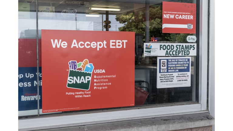 SNAP and EBT Accepted here sign. SNAP and Food Stamps provide benefits to help the budgets of disadvantaged families.
